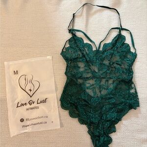 Emerald green lace bodysuit